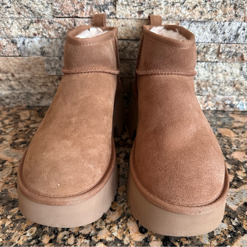 UGG®
Classic Ultra Mini New Heights Platform Boot - Picture 7 of 11